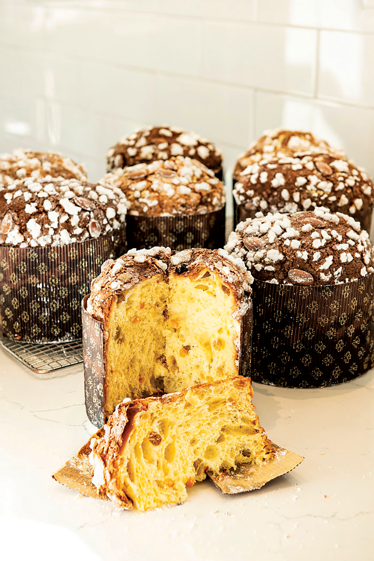 Group of panettone, one in front is sliced