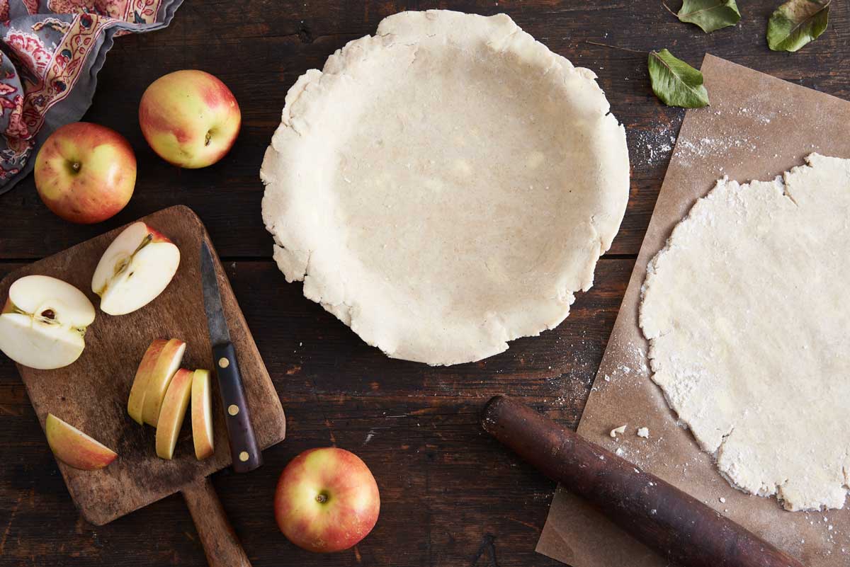 Unbaked gluten-free pie crust in pan
