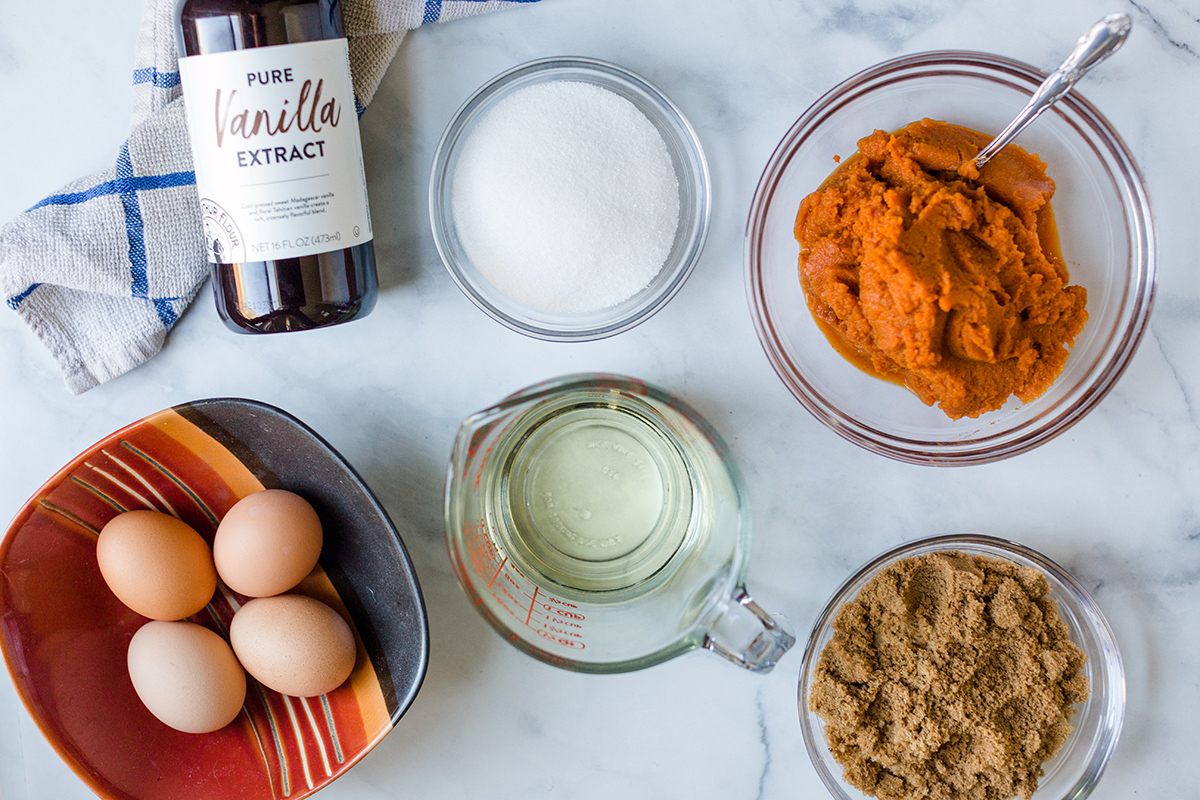 Ingredients needed to make a pumpkin Bundt cake with espresso swirl