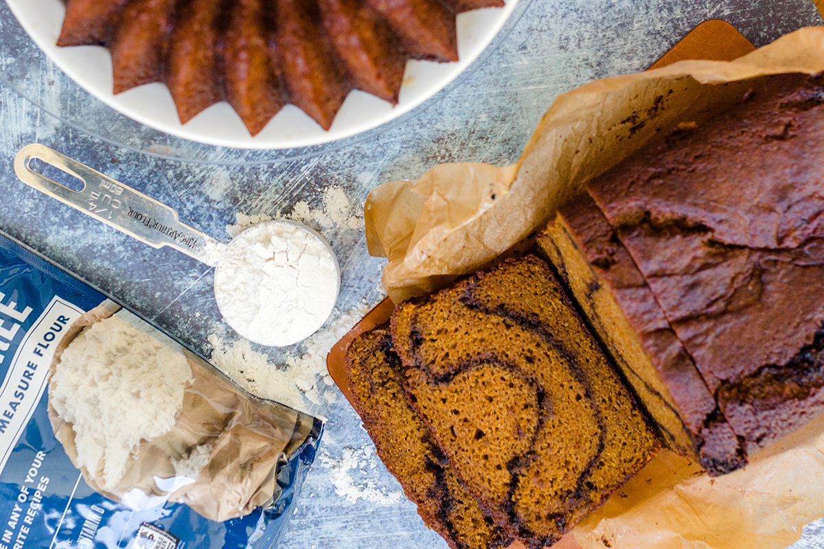 Gluten-free pumpkin Bundt cake with an espresso swirl with a bag of Measure for Measure Flour