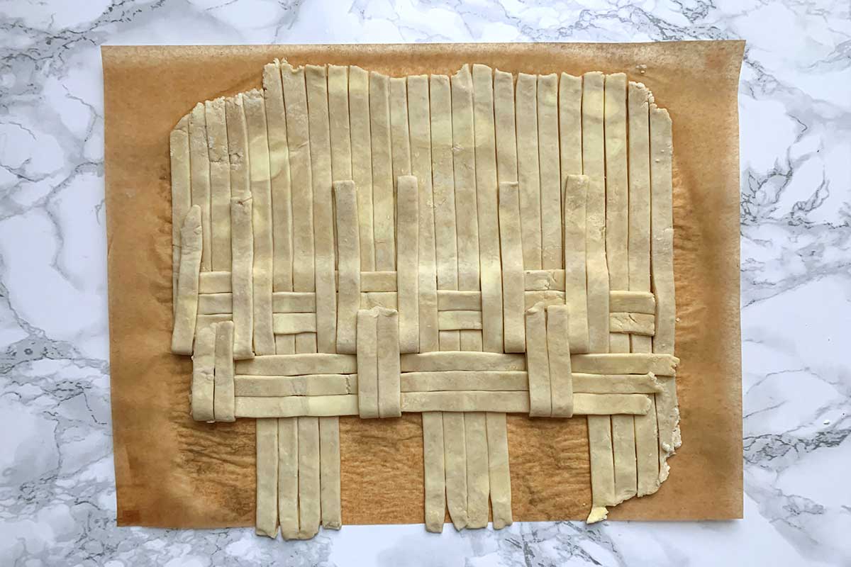 Same dough as previous image, with all vertical strips folded back 
