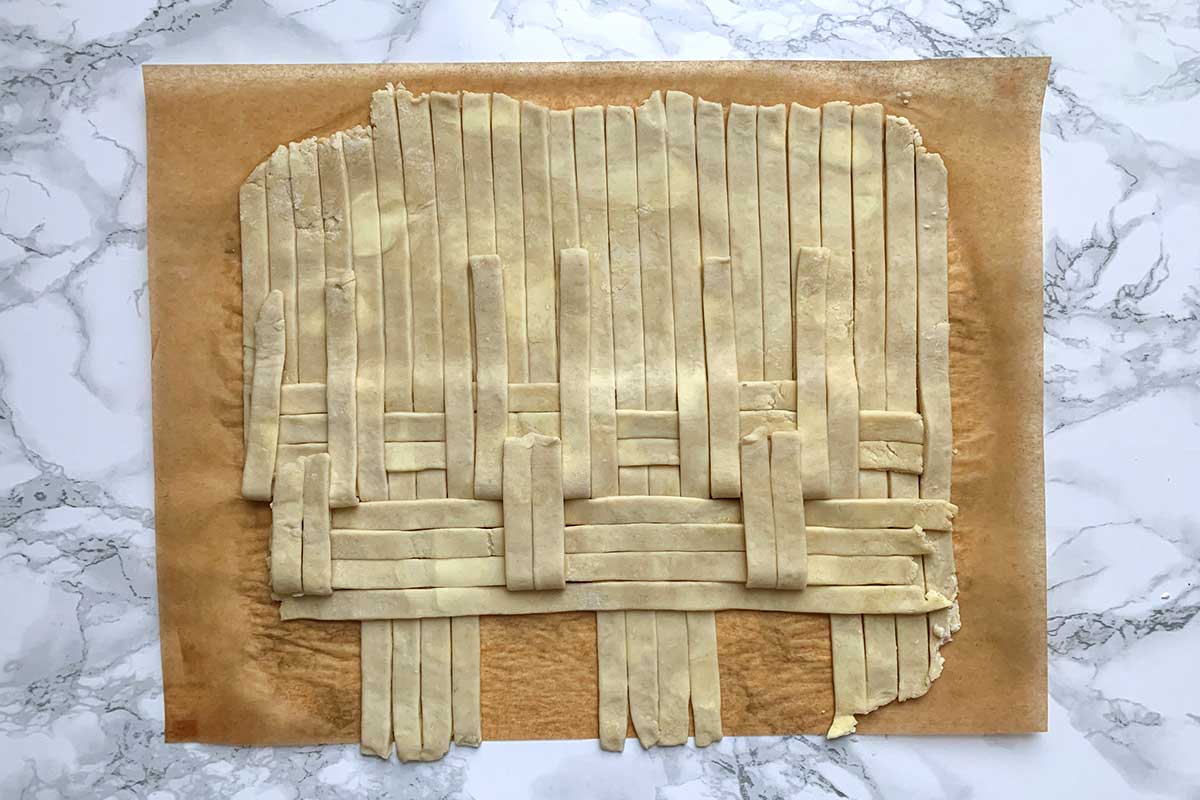 Same dough as previous image, with one horizontal sheet of dough laid across