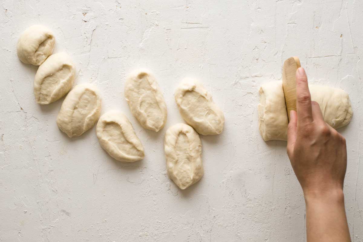 Cutting log of dough into sections