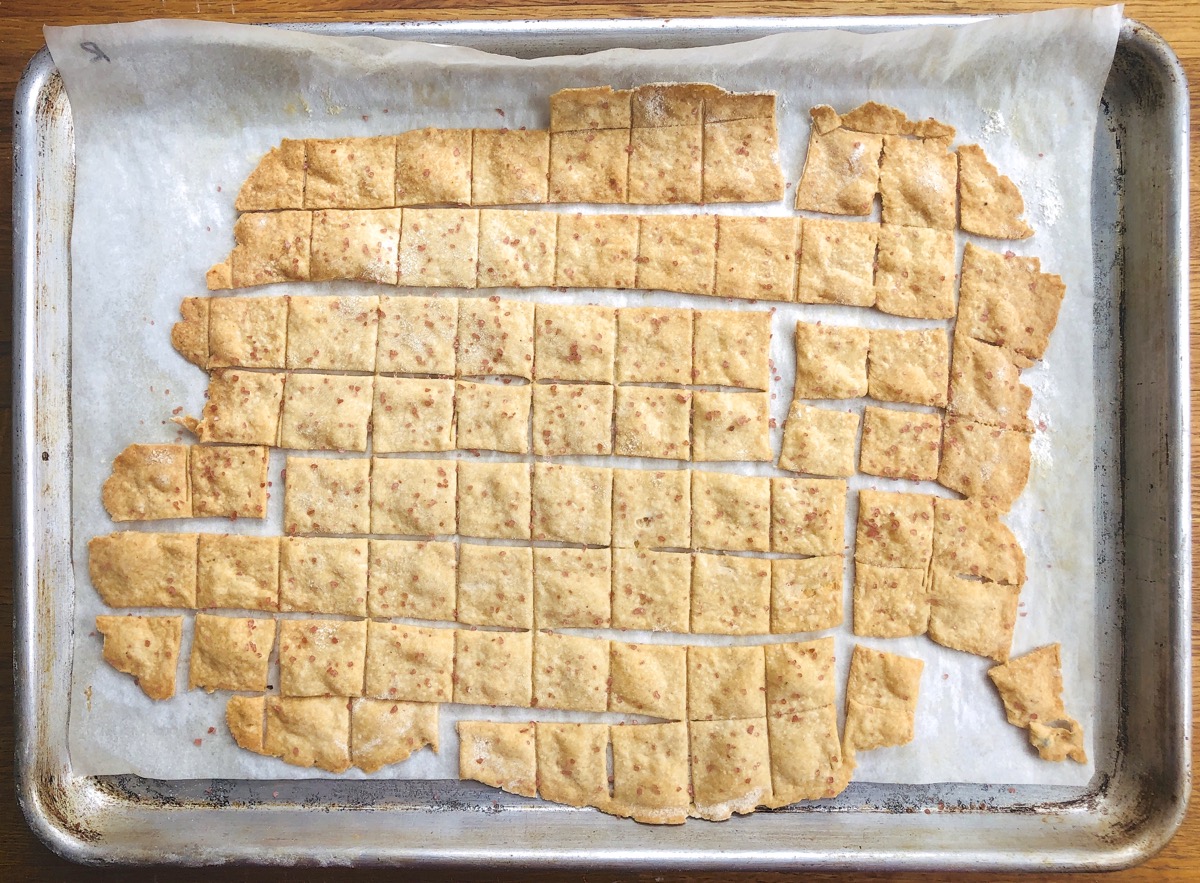 Sourdough crackers on a baking sheet, baked.