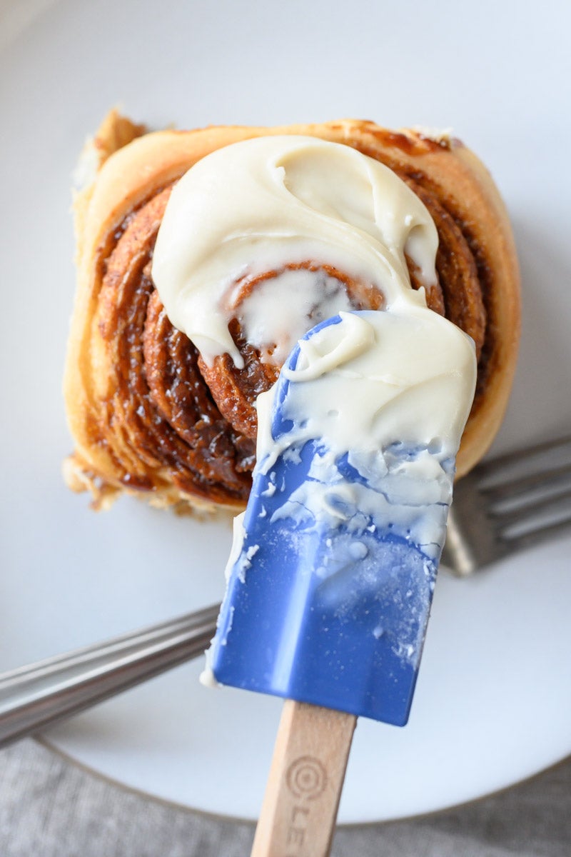 Icing sourdough cinnamon buns.