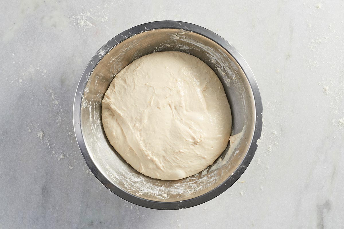 A bowl of sourdough dough rising