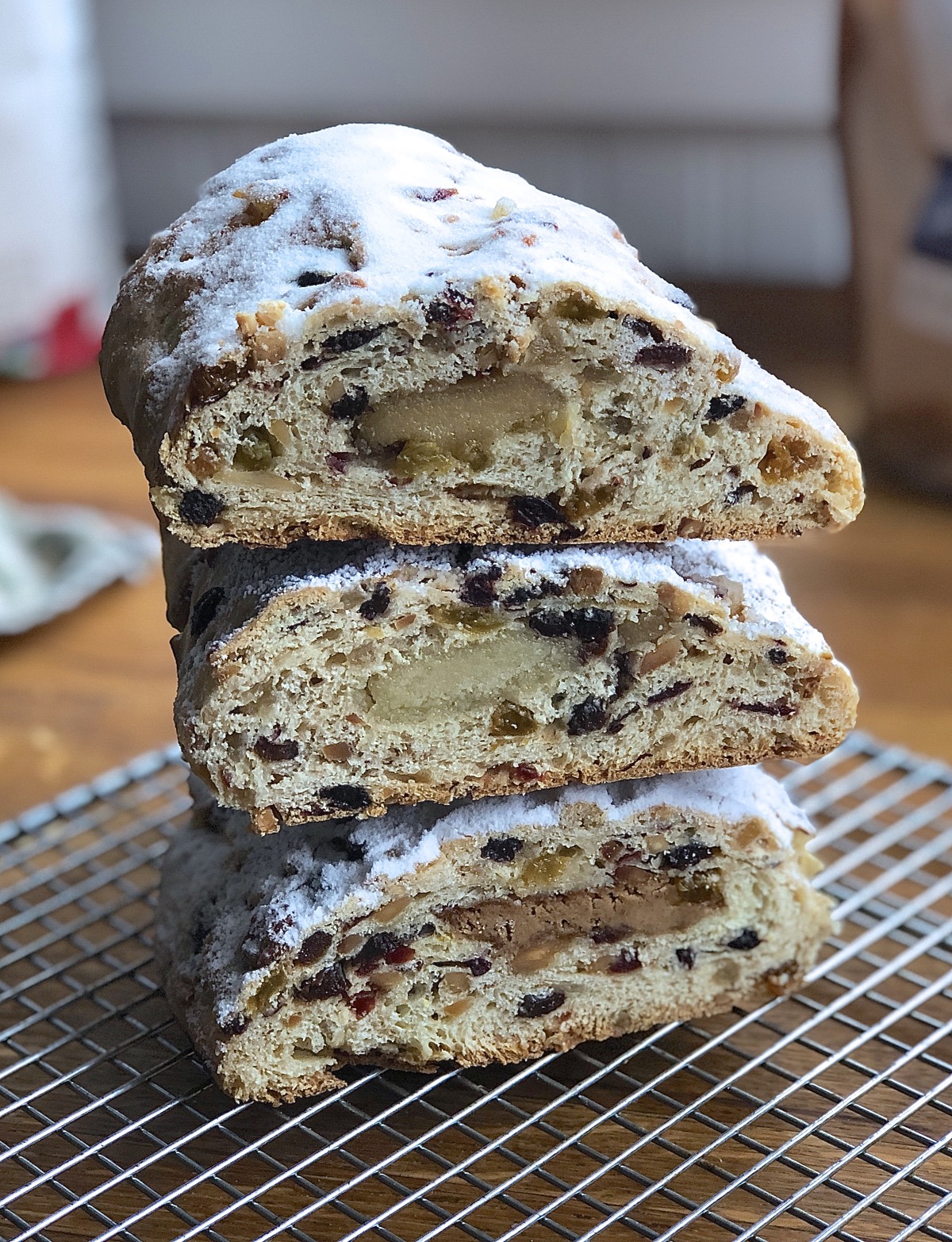 Three stollen, three different fillings, each cut crosswise to show filling.