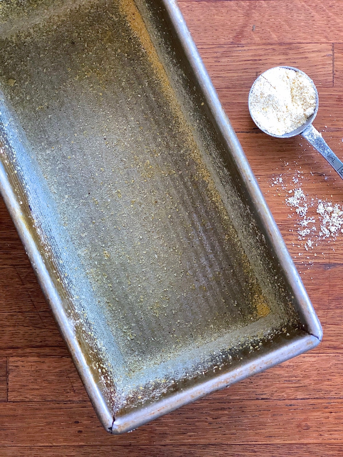 Loaf pan, interior lightly greased and sprinkled with cornmeal.