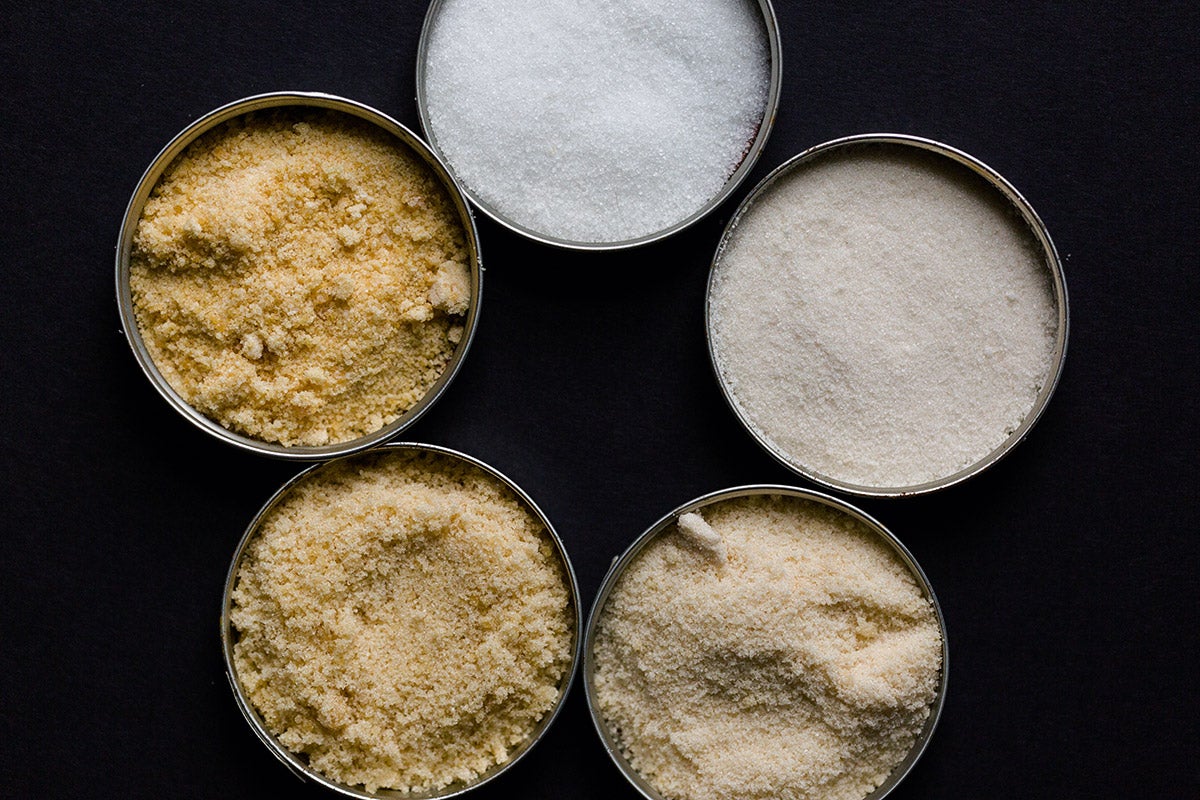 Five small dishes of sugar, each toasted for an hour longer than the previous dish