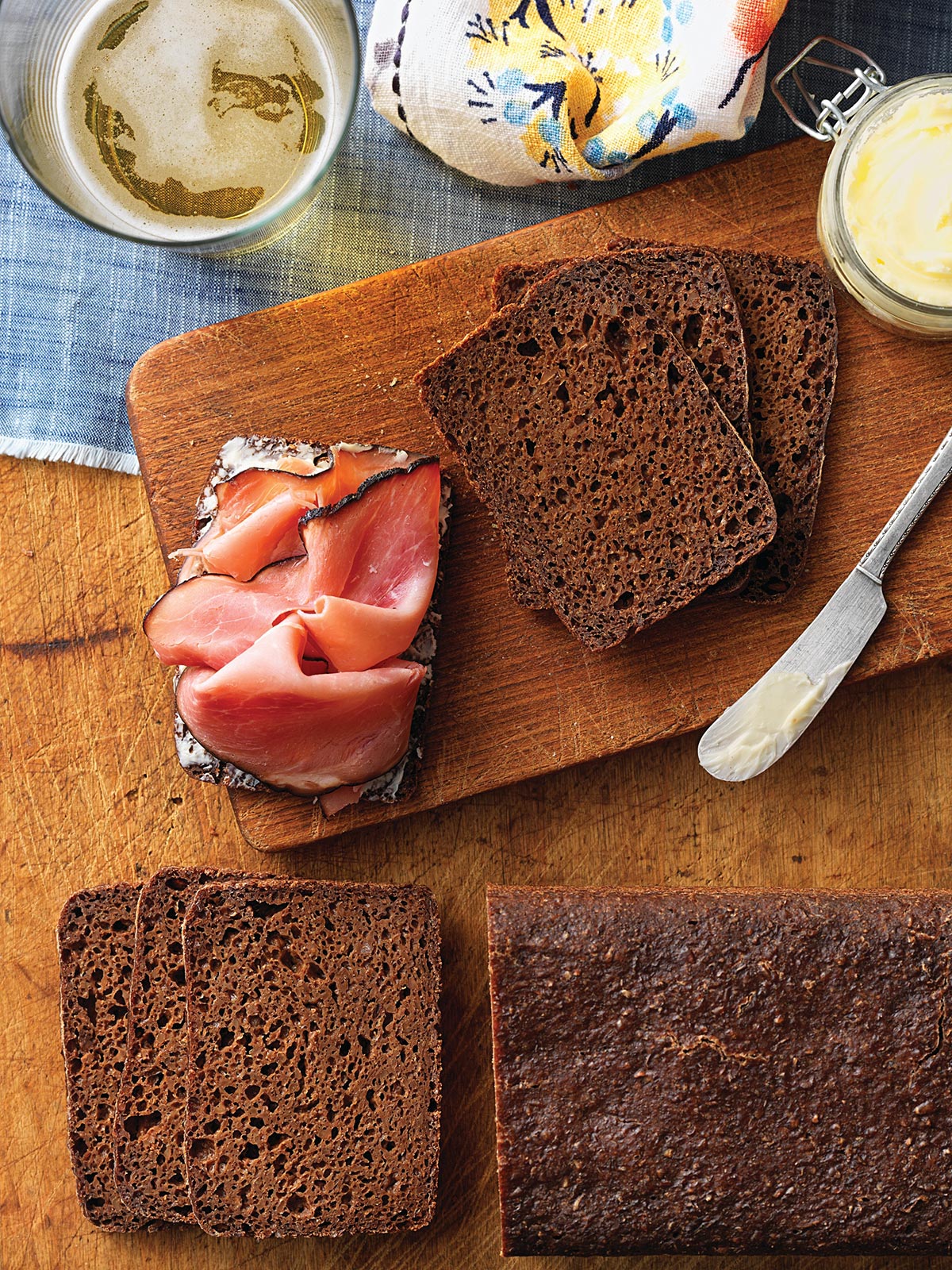 Westphalian Rye Bread cut into slices, topped with smoked ham