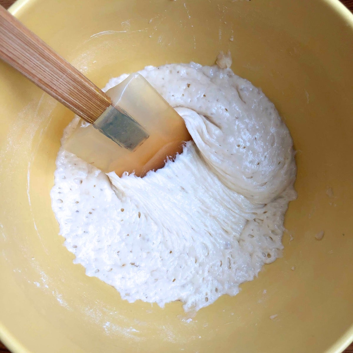 Yeast water and flour after 16 hours; the dough has become bubbly and stretchy.