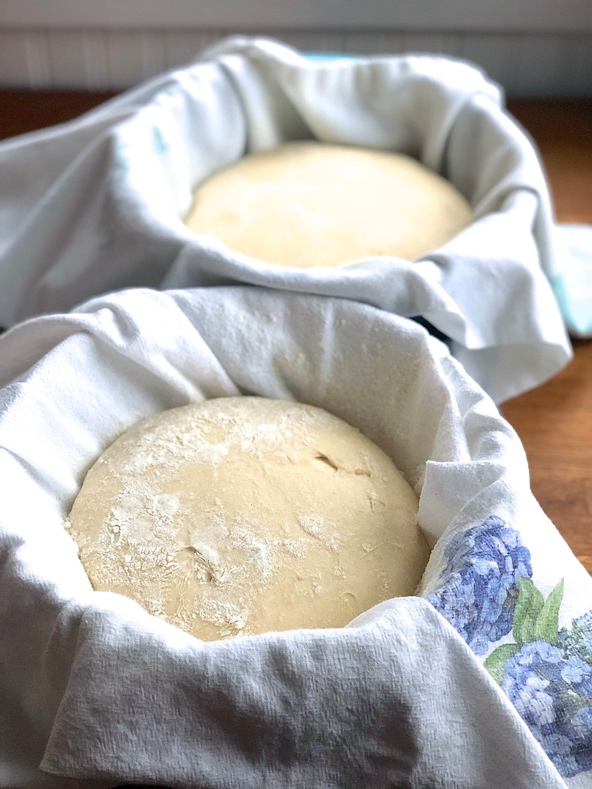 Shaped dough in a towel-lined bowl after 3 1/2 hours of rising, ready to bake..