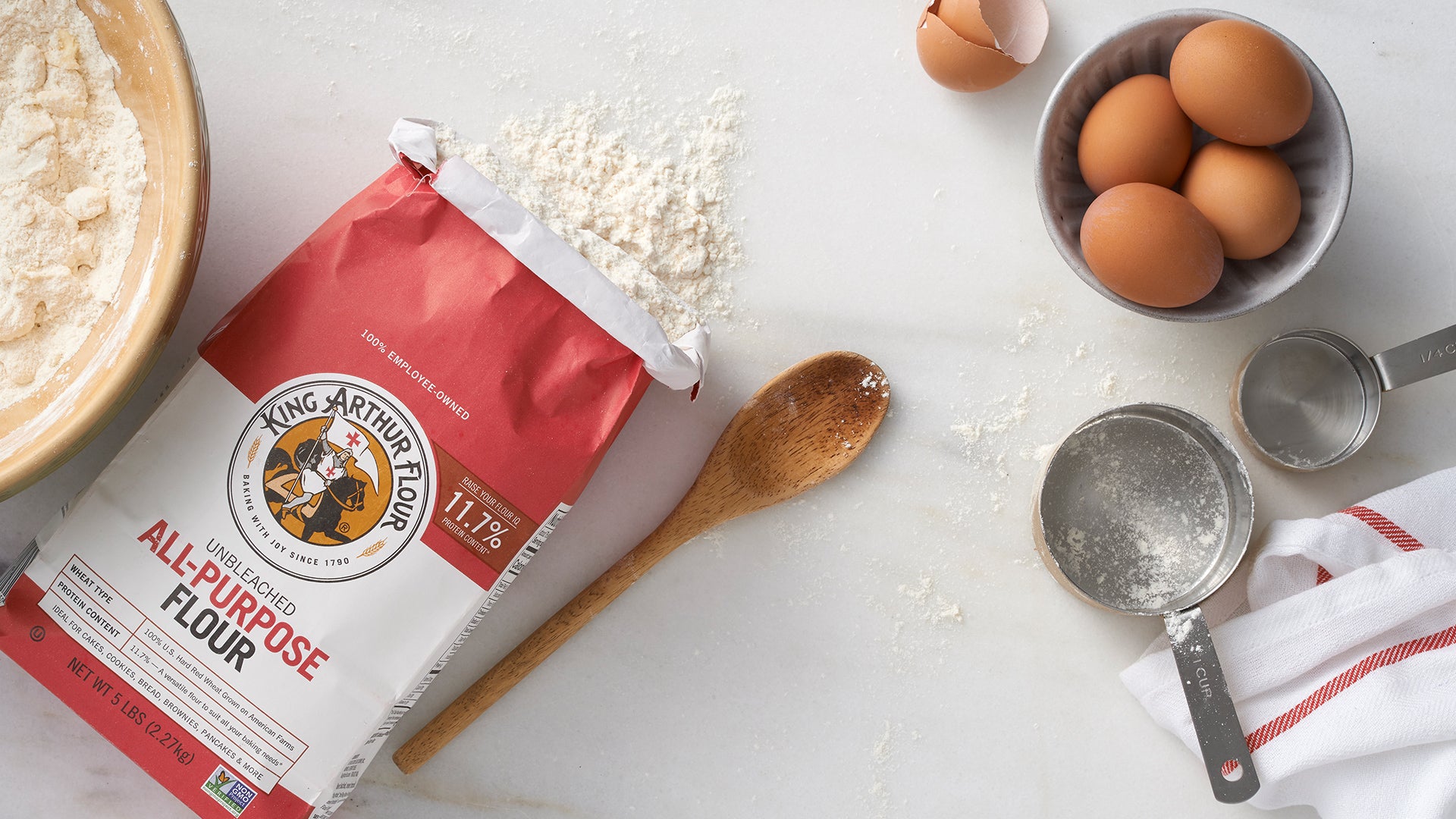 A bag of all purpose flour on a counter top