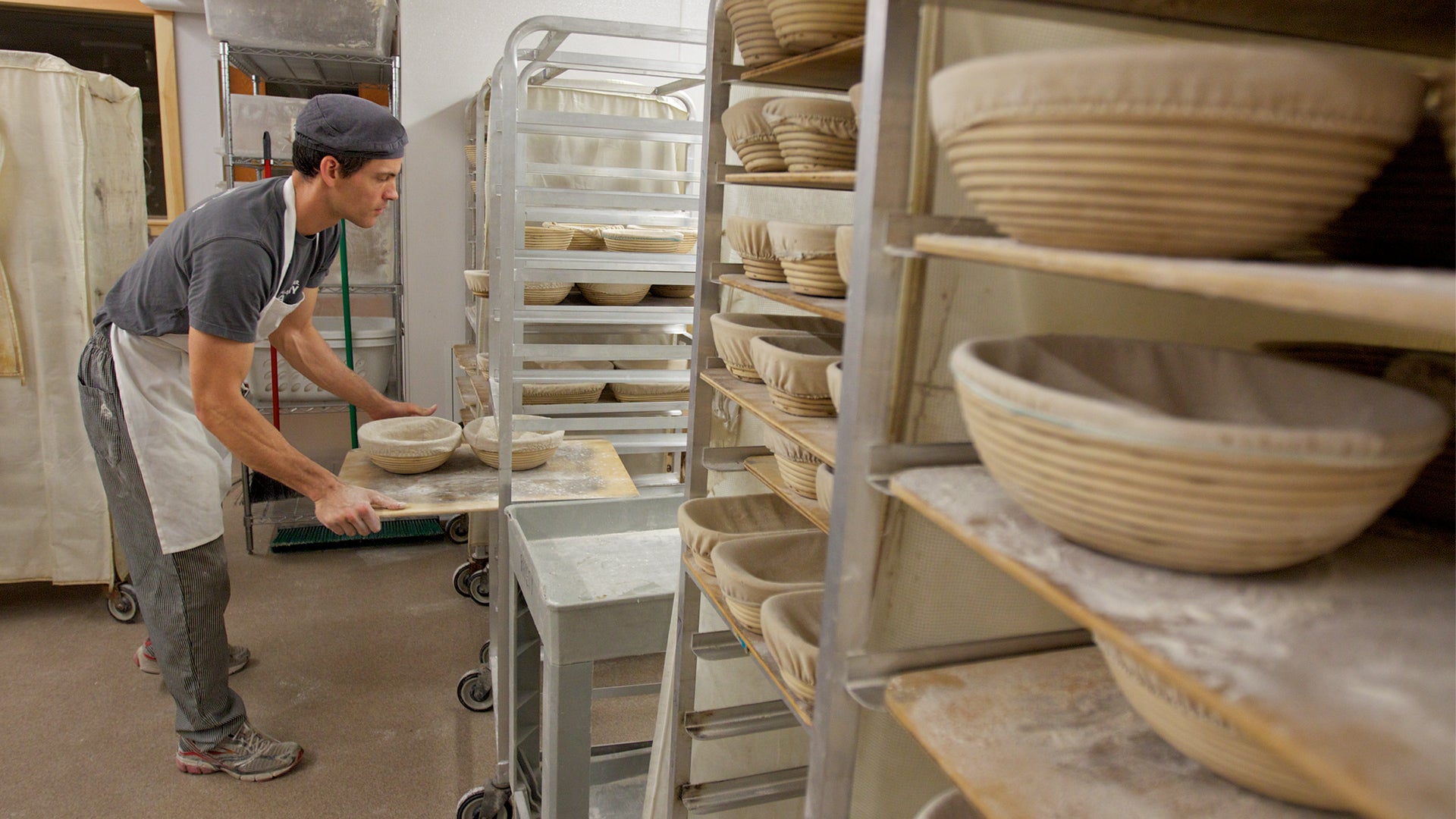 Baker Martin Philip at work in the King Arthur bakery