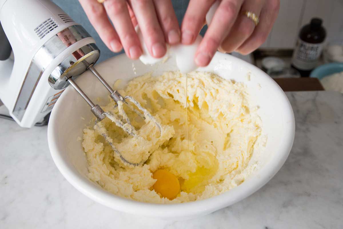 Adding egg to creamed butter and sugar