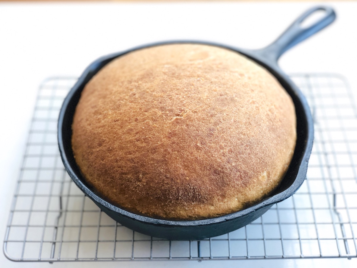 Sourdough bread baked in a cast iron skillet.