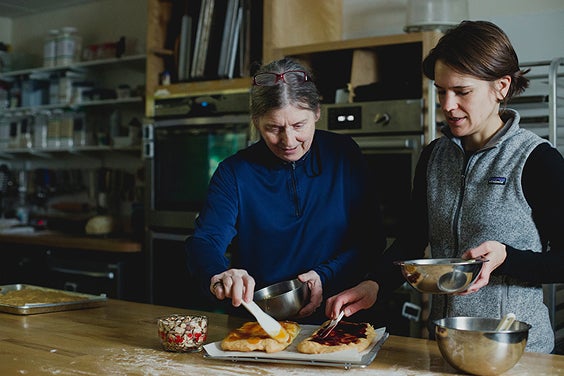 Two employee-owners baking in the test kitchen