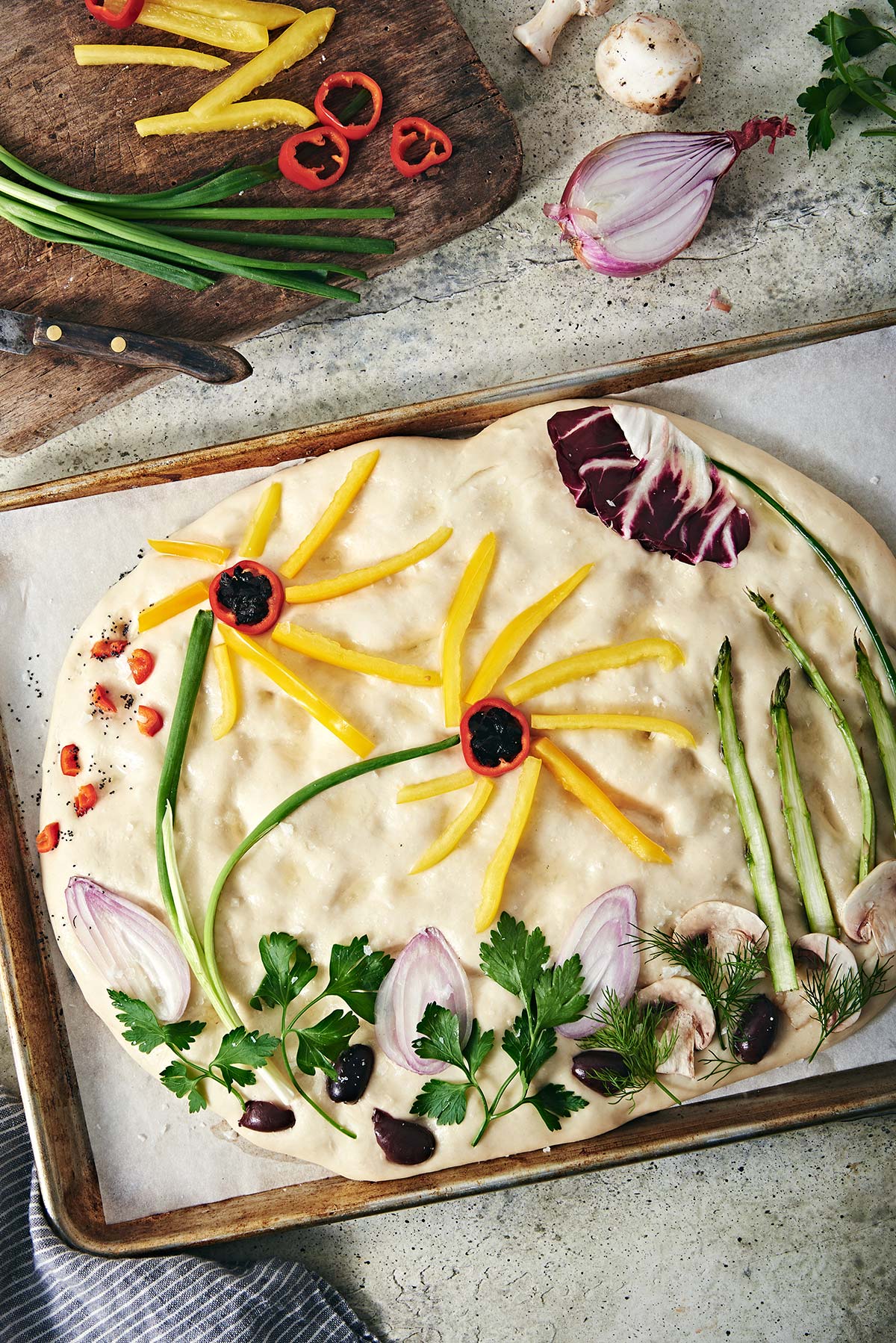 A garden focaccia about to be baked