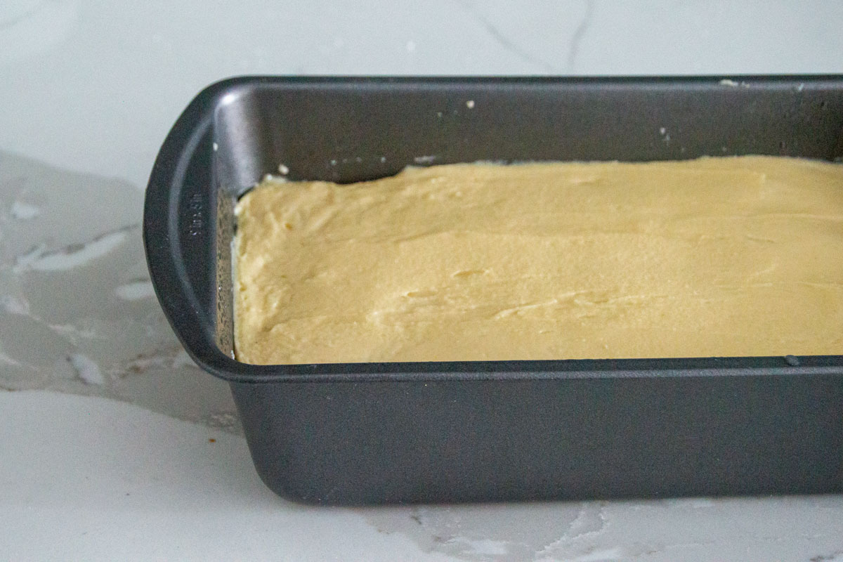 Batter in loaf pan, with smooth top