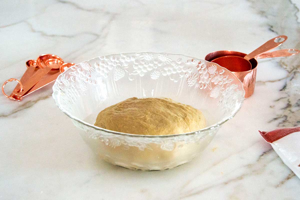 Bowl with risen keto bread dough