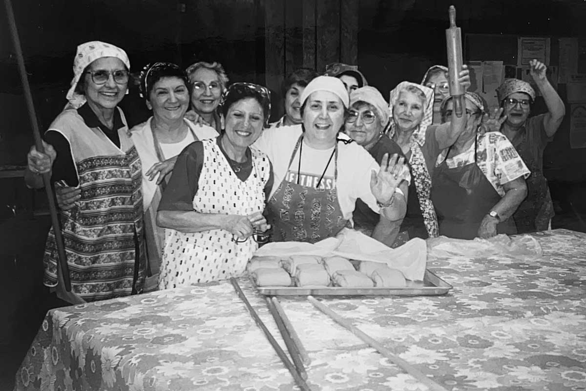 Church bakers making katah together