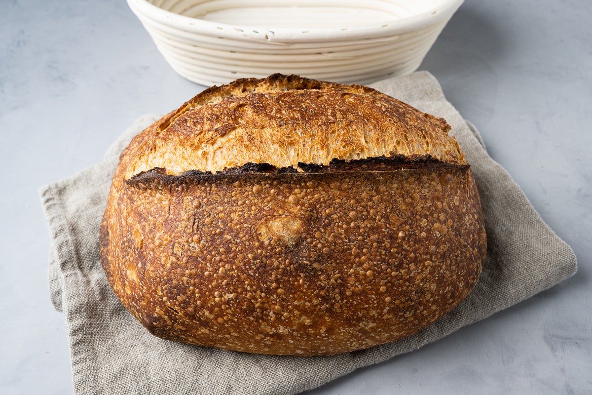 Sourdough ear on a baked loaf