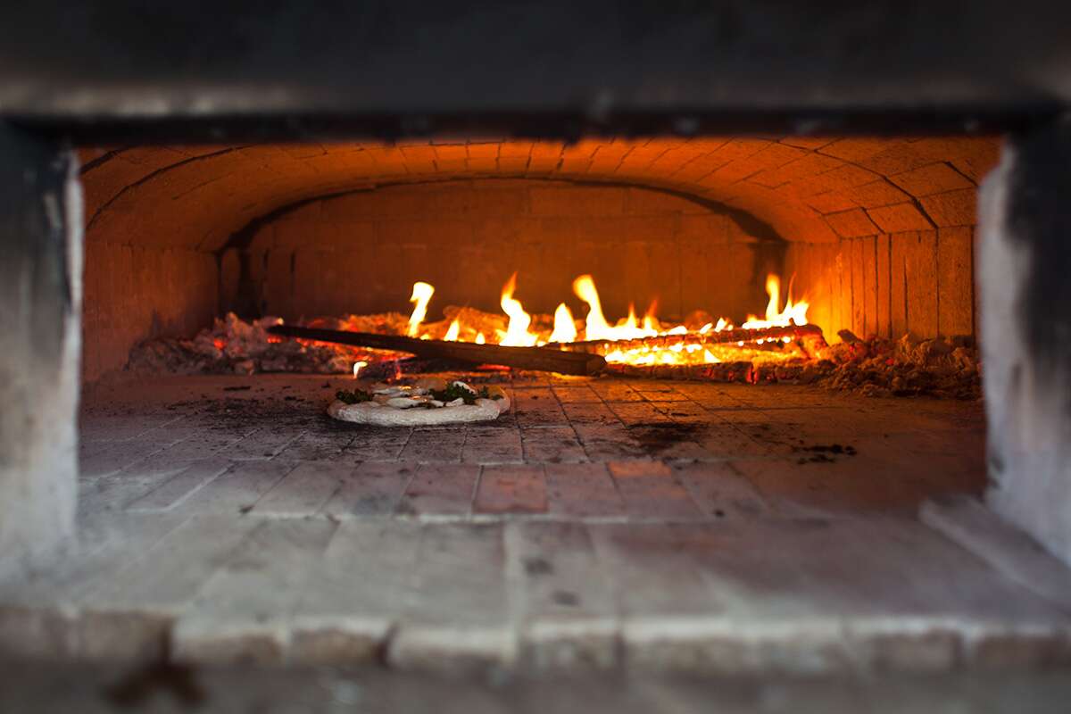 Pizza in a wood-fired oven