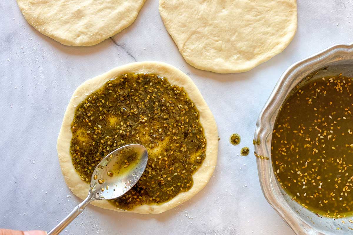 Za'tar being used to top Fatayer dough