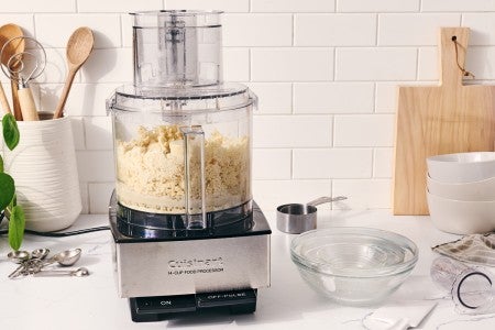 Food processor being used to make almond paste