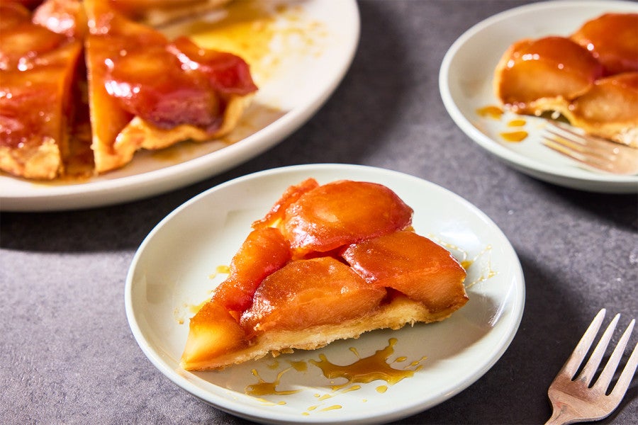 A slice of Classic Apple Tarte Tatin on a plate