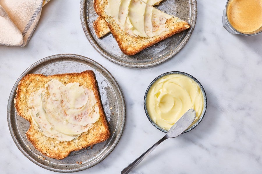 Slices of toast spread with cultured butter