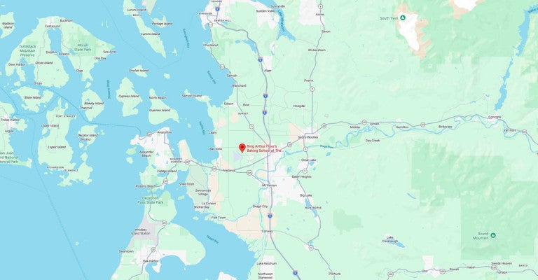 A pin on a map showing the location of King Arthur Baking in the Skagit Valley, Washington.