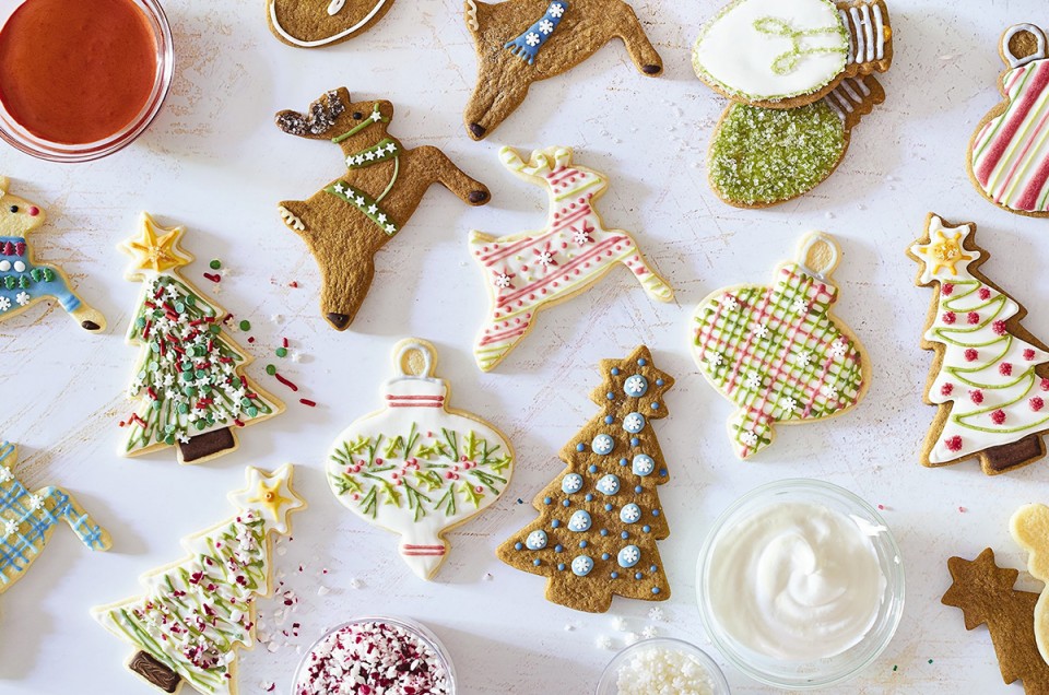 Christmas-themed cookies decorated with naturally colored icing
