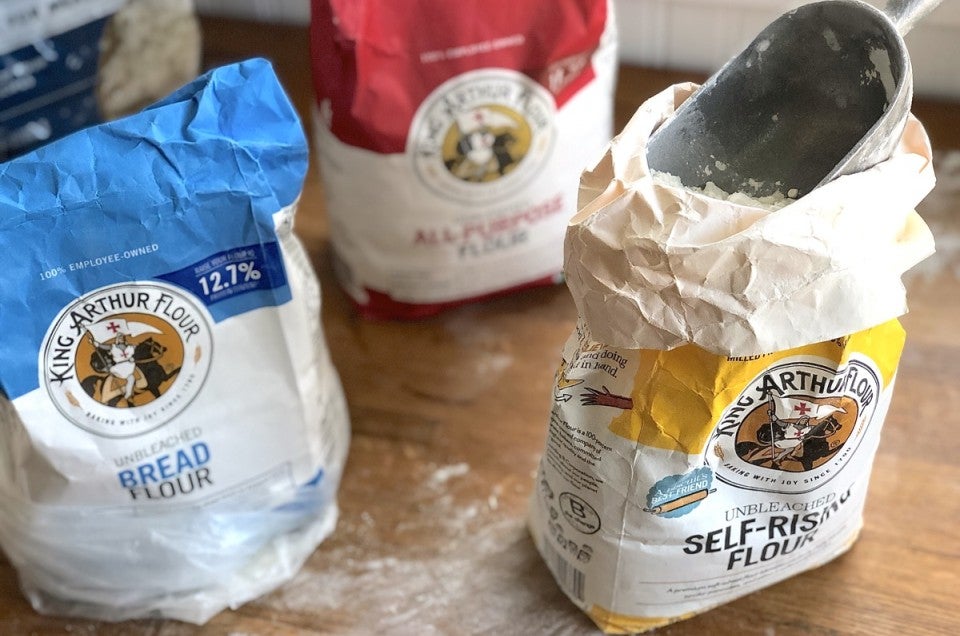Open bags of flour on table