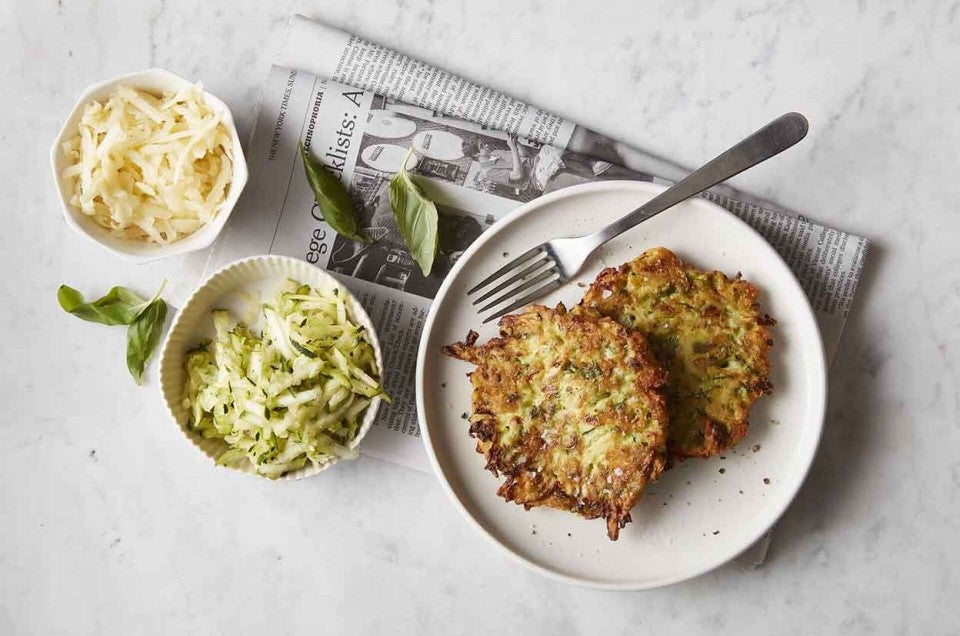 Plated zucchini-cheese pancakes