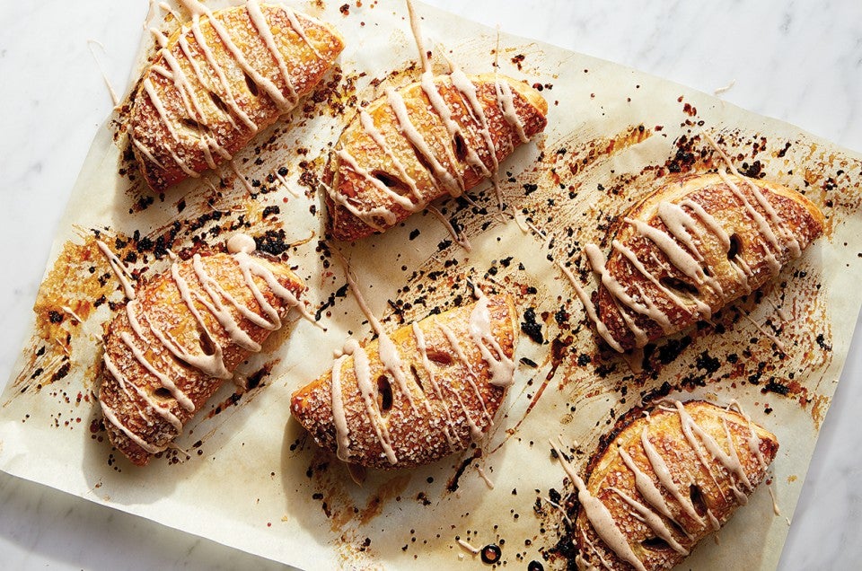 Apple Turnovers with Chai-Spiced Cider Glaze