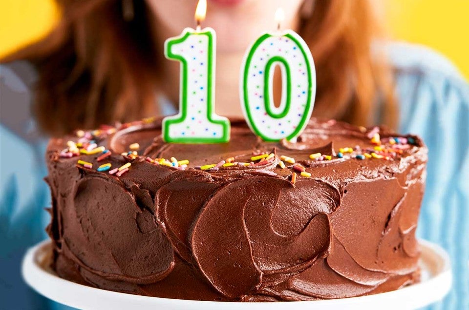 A chocolate cake with a number 10 candle in the top