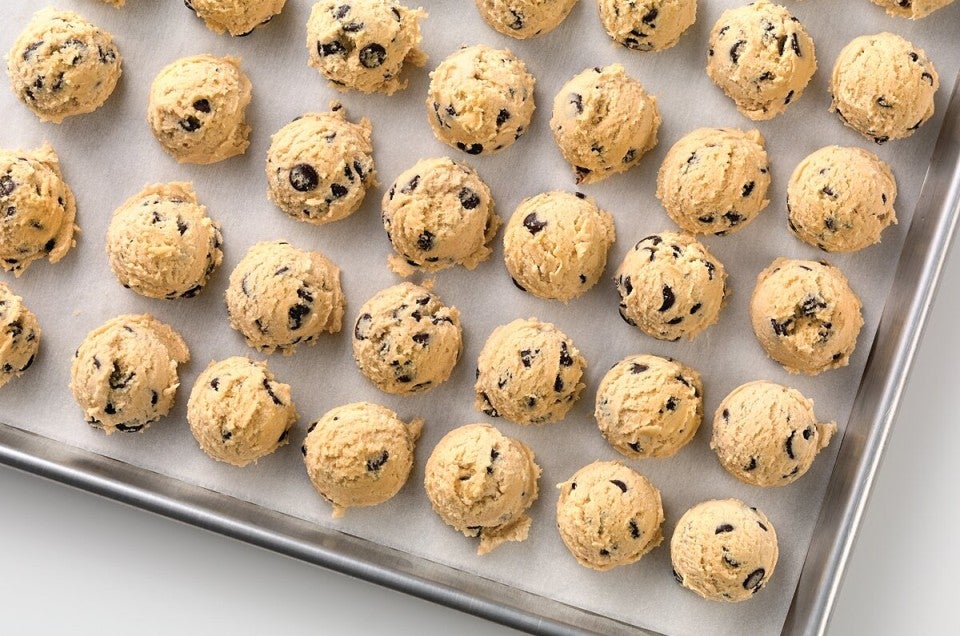 A tray of cookie dough about to go into the freezer