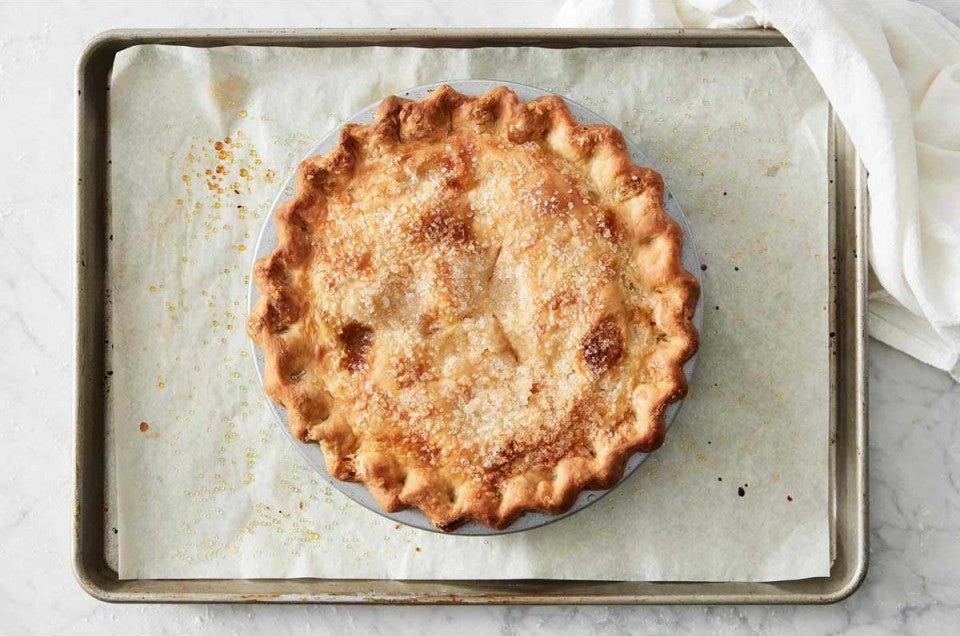 Baked pie on parchment lined baking sheet