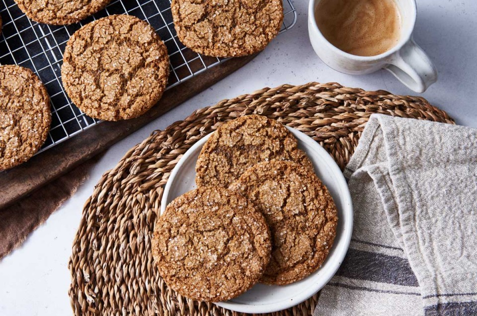 Spiced rye ginger cookies on plate and cooling rack