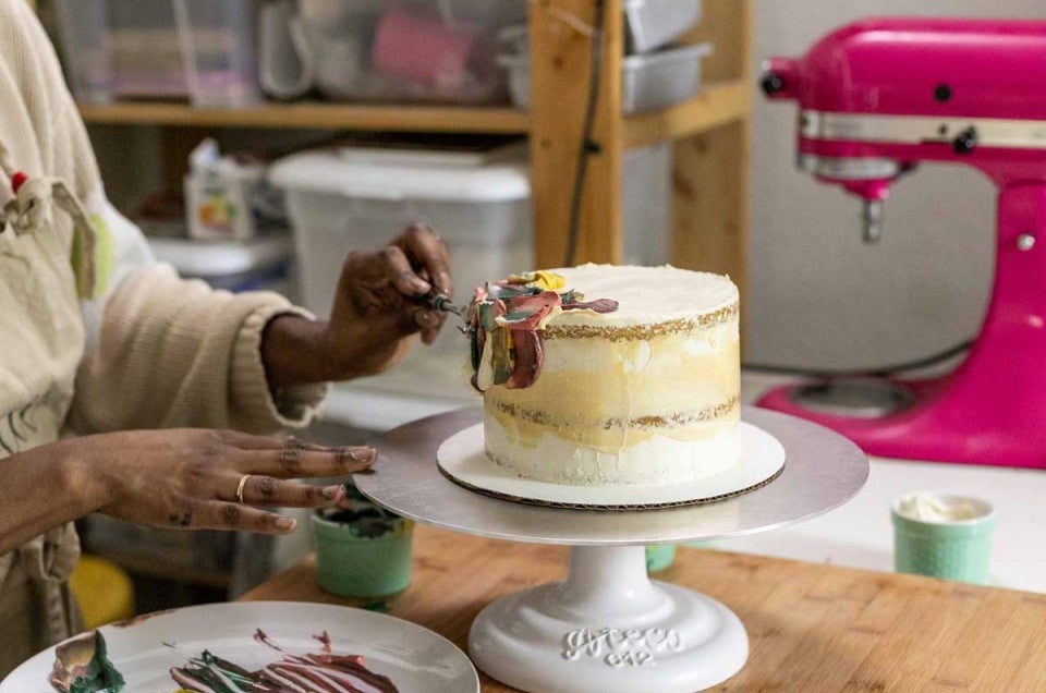 Decorating a cake with painting technique