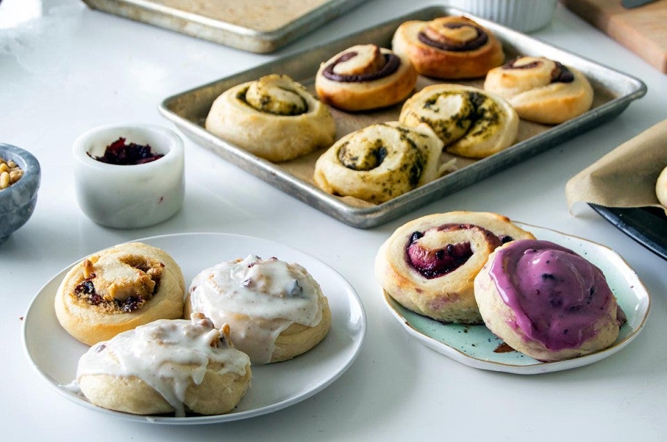 Plates of cinnamon rolls with different fillings