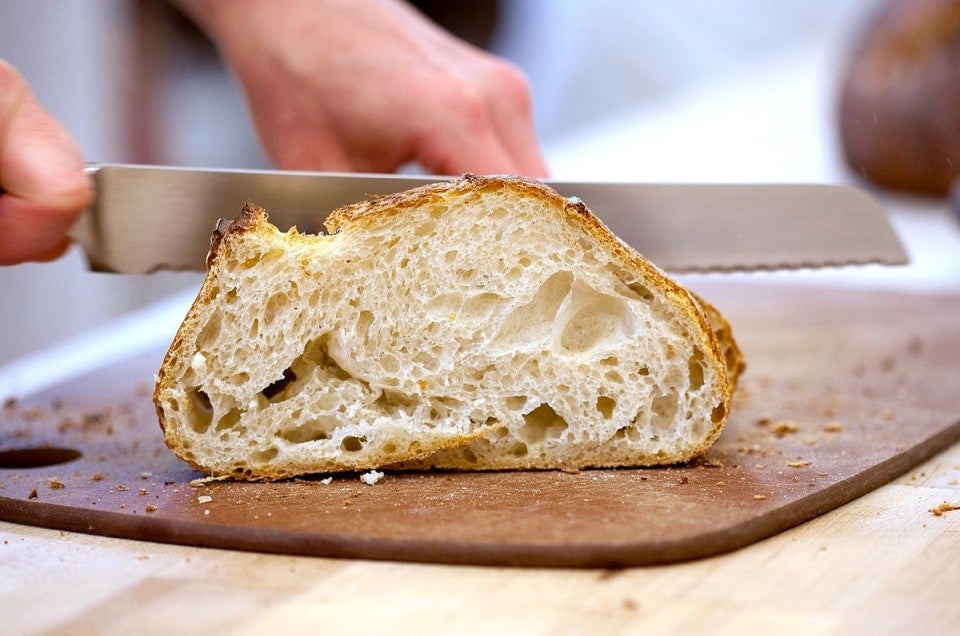 sourdough bread being sliced