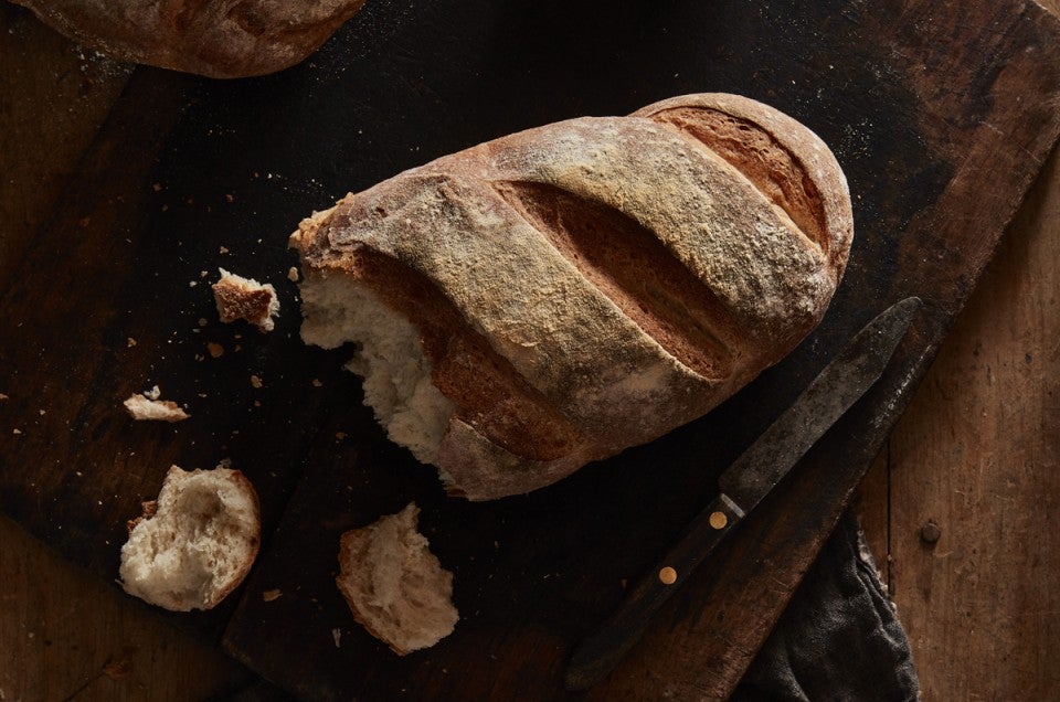 Torn loaf of bread