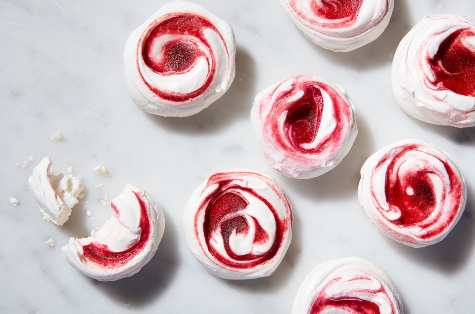 Meringues swirled with cranberry curd and lime