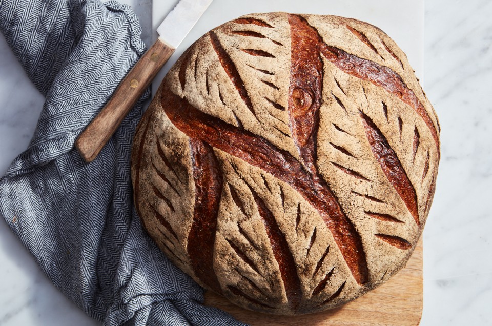 Loaf of Honey-Beer Miche with deep golden brown crust