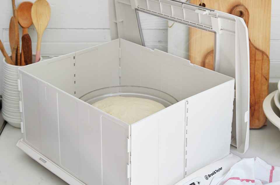 Bread proofer with lid off to show dough 