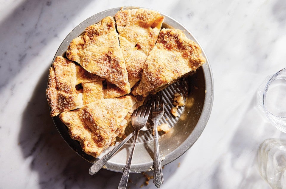 Apple pie, sliced in the pie plate