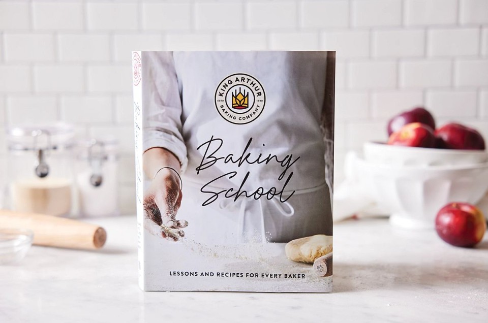 Copy of Baking School cookbook on a kitchen counter