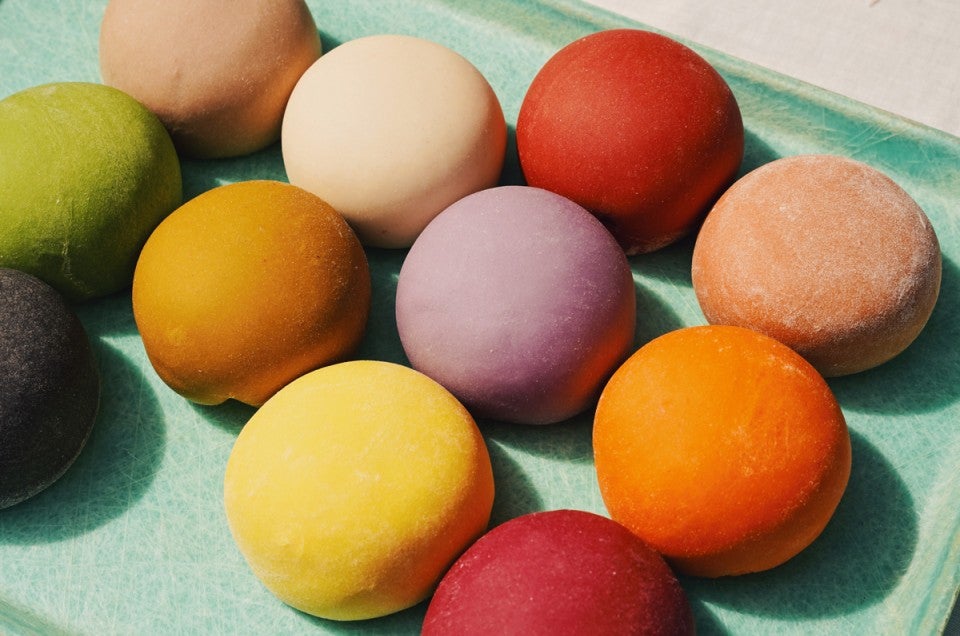 Multiple colored doughs next to each other